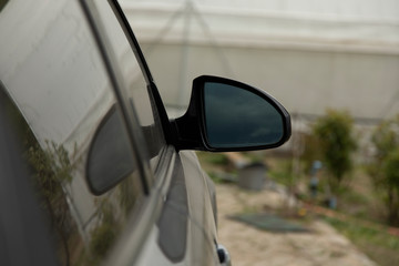 a car mirror in the yard