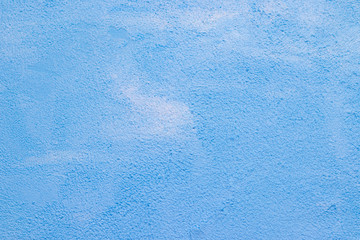 Fototapeta na wymiar The texture is a patched wall . Blue texture of the wall. Abstract background. .