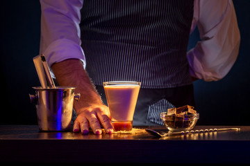 Bartender making Baileys comet cocktail