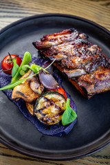 Grilled ribs with bbq sauce, purple potato purée