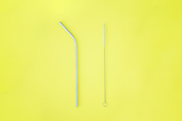 The beautiful metal straw and the brush for cleaning it for party sustainable goods