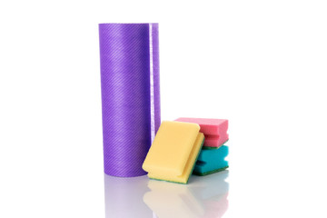 Cleaning products. Colorful, yellow kitchen sponges for foam isolated on white background. Household cleaner service. Clean supplies equipment.