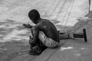 young man with a  scooter i builds myself  repair 