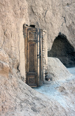 carved wooden door to the cave of the dervish near Mausoleum of Saint Daniel, Samarkand, Uzbekistan