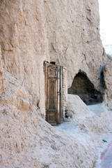 carved wooden door to the cave of the dervish near Mausoleum of Saint Daniel, Samarkand, Uzbekistan