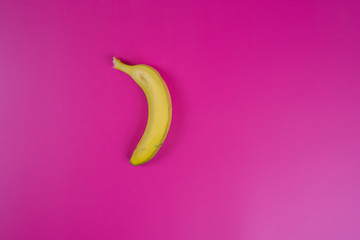 YELLOW BANANA on fuchsia background