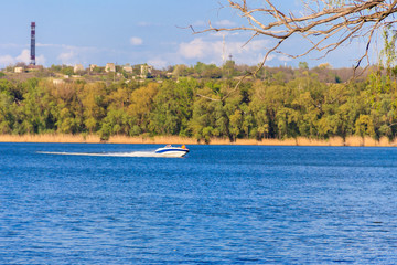 Speedboat sailing on the Dnieper river in Kremenchug, Ukraine