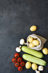 Layout of food on a black background. Food delivery in a package.