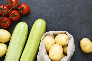 Layout of food on a black background. Food delivery in a package.