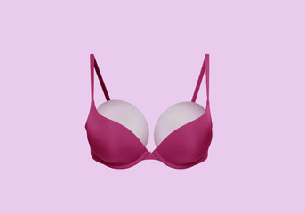 Obraz na płótnie Canvas Silicone breast art. Pink bra. Breast implant disease. Plastic surgery. Breast augmentation. Mammoplasty