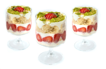 magnolia desserts with glass on isolated white background