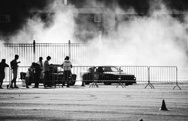 drift cars in smoke