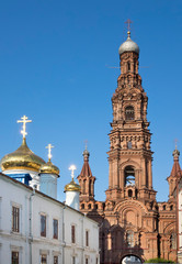 Fototapeta na wymiar Bell Tower of Kazan Epiphany Church, located on the central Bauman street. Republic of Tatarstan, Russia