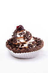 Chocolate cookie with cream and cherry on white - 347971847