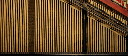Close-up of the interior of an old piano.