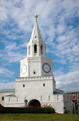 Fototapeta na wymiar Spasskaya tower of the Kazan Kremlin with a big clock and a star on top. Republic of Tatarstan, Russia