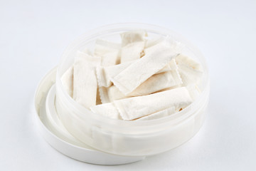 Fototapeta na wymiar snus nicotine bags. chewing tobaсco product over white background. alternative to smoking cigarettes.