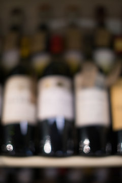 Wine Bottles In The Wine Cabinet Out Of Focus