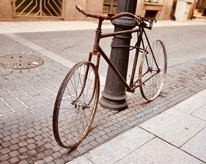 Naklejka na ściany i meble vintage bicycle on the street