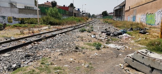 view of the railway full of garbage