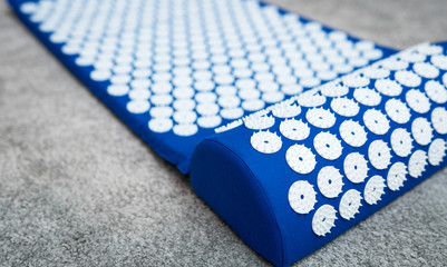 Blue acupuncture rug. Alternative china medicine.