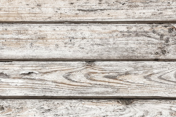Grunge wooden desk. Brown board background. Natural wood pattern texture. Plank construction with knots.