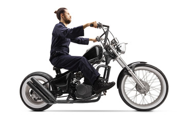 Obraz na płótnie Canvas Mechanic riding a chopper motorbike