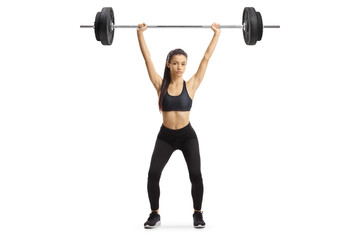 Fototapeta na wymiar Young woman exercising weight lifting