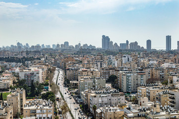 Obraz premium City with high-rise buildings and hotels on a background of sky