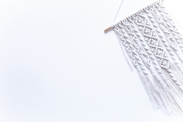 macrame on white background, place for text,, banner, flat layout, top view, handmade, hobby, creativity, copy space