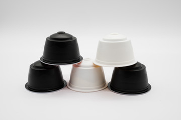 Five coffee refill pods from a modern type home coffee machine