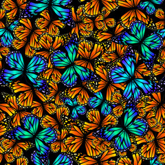 Fototapeta na wymiar A lot of flying butterflies. Abstract butterflies seamless pattern. Vector illustration