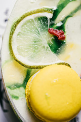 Juicy lemon slice on a bright sweet tasty cake slice close up still