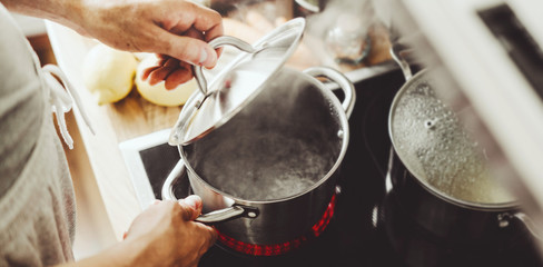 Man cooking fresh food at home