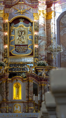 Fototapeta na wymiar AGLONA, LATVIA – MAY 3 , 2020: Majestic Aglona Cathedral One of the Most Important Catholic Spiritual Centers in Latvia. Deatail of the Interior of an Old Church.
