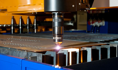 Laser cutting machine for metal in work.
