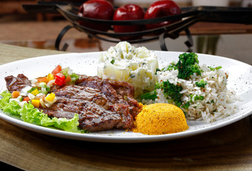 Grilled meat with trimmings