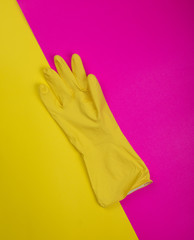color rubber gloves for cleaning on color background, workhouse concept.  General or regular...