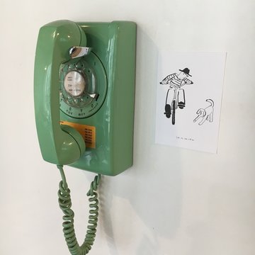 Close-up Of Rotary Phone On Wall