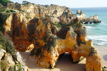 beautiful rock formations and arches at beach near Alvor in the Algarve