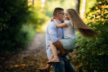 Fototapeta premium Happy daughter with her father in the park