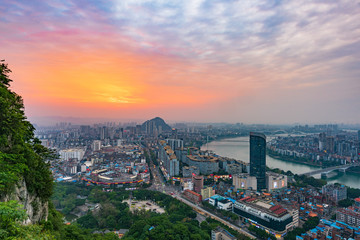 Fototapeta na wymiar City skyline scenery at sunset in Ma'anshan, Yufeng District, Liuzhou City, Guangxi, China