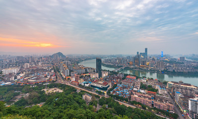 City skyline scenery at sunset in Ma'anshan, Yufeng District, Liuzhou City, Guangxi, China