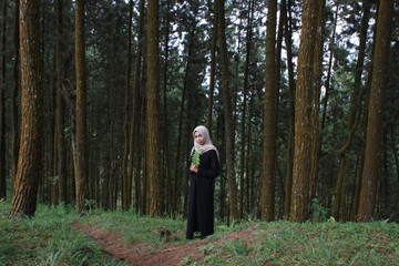 Hijab girl in the forest