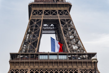 French flag waving in the middle of the Eiffel Tower during coronavirus lockdown at President...