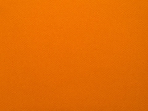 Color orange paper texture background for well use text present or promote your goods, products on free space background.