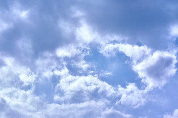 Fototapeta na wymiar cumulus clouds with sun's lumens color sky