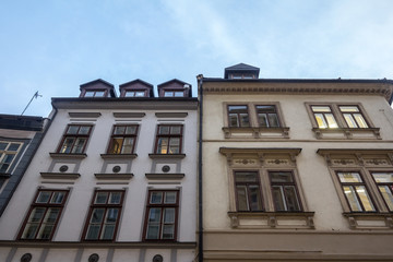 Typical Medieval Facade of an old apartment residential building in a street of old town, the historical center of Prague, Czech Republic, in the most touristic part of the city
