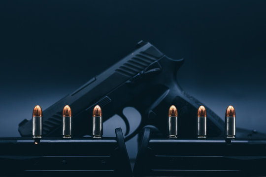 9 mm ammunition on a black background