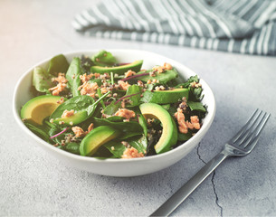 Avocado Salad With Salmon Flakes on Concrete Table